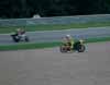 Rennen zur 250cc Klasse: Randy De Puinet (17) auf Abwegen, im Hintergrund zischt Ralf Waldmann vorbei
